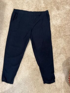 Black Yazdi rayon pants with button at ankle, size L